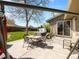 Large backyard with patio, furniture, grill, and hot tub at 4779 S Owens Way, Littleton, CO 80127