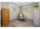 Bright bedroom with plush carpeting, natural light, and stylish accents at 4779 S Owens Way, Littleton, CO 80127