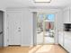 Bright kitchen with outdoor access and stainless steel dishwasher at 4779 S Owens Way, Littleton, CO 80127