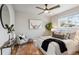 Cozy bedroom featuring a comfortable bed and hardwood floors at 2686 Poplar St, Denver, CO 80207