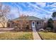 Brick ranch home with landscaped yard and walkway at 2686 Poplar St, Denver, CO 80207