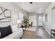 Bright and airy home office with built-in shelving and hardwood floors at 2686 Poplar St, Denver, CO 80207