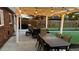 Relaxing patio area with pergola, string lights, and outdoor seating at 2686 Poplar St, Denver, CO 80207