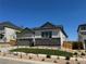 Stylish home with a two-car garage, modern stonework, and newly planted landscaping for great curb appeal at 16655 W 93Rd Pl, Arvada, CO 80007