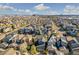 Wide aerial view of a suburban neighborhood showcasing rooftops and street layout at 1857 W 67Th Pl, Denver, CO 80221