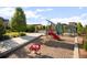 The modern playground features a variety of play structures and green spaces for community enjoyment at 1857 W 67Th Pl, Denver, CO 80221