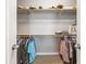 Walk-in closet with organized shelving and hanging space for clothes and accessories at 1857 W 67Th Pl, Denver, CO 80221