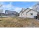 Private backyard featuring a wooden fence, patio area, and additional storage options attached to the house at 4552 S Buckley Way, Aurora, CO 80015