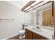 Functional bathroom features a single sink vanity, a shower with tile surround at 250 Cypress Ln, Broomfield, CO 80020