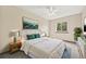 Cozy bedroom featuring a large bed, stylish decor, and a picturesque window view at 250 Cypress Ln, Broomfield, CO 80020