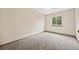 Neutral bedroom offers a calming color palette and soft carpet at 250 Cypress Ln, Broomfield, CO 80020