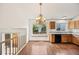 Bright dining area featuring wood floors, an elegant chandelier and natural light at 250 Cypress Ln, Broomfield, CO 80020