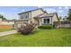 Charming home with a well-manicured lawn, partial fence, and beautiful exterior paint at 250 Cypress Ln, Broomfield, CO 80020