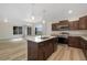 Stylish kitchen with stainless steel appliances and a center island perfect for meal preparation at 323 Josef Cir, Fort Lupton, CO 80621
