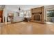 Inviting living area with hardwood floors, a comfortable sofa, and a charming brick fireplace at 481 Sunrise Dr, Golden, CO 80401