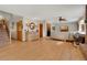 Spacious living area with hardwood floors, a decorative cabinet, and plenty of room for entertaining at 481 Sunrise Dr, Golden, CO 80401