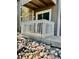 Exterior view of unit's balcony with stone and siding exterior at 4400 S Quebec St # 102R, Denver, CO 80237