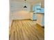Bright dining area with wood flooring and pendant lighting at 4400 S Quebec St # 102R, Denver, CO 80237