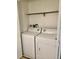 Functional laundry area with a washer and dryer for convenience at 4400 S Quebec St # 102R, Denver, CO 80237