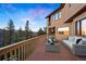 Inviting back deck with mountain views and comfortable seating at 29011 Upper Moss Rock Rd, Golden, CO 80401