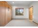 Bedroom with built in storage, and a window that provides natural light at 29011 Upper Moss Rock Rd, Golden, CO 80401