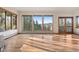 Living room with hardwood floors and mountain view at 29011 Upper Moss Rock Rd, Golden, CO 80401