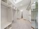 Spacious walk-in closet with custom shelving and carpeted floor; a dressing area at 29011 Upper Moss Rock Rd, Golden, CO 80401