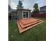 A backyard featuring a large wood deck, perfect for outdoor enjoyment at 4520 S Delaware St, Englewood, CO 80110