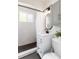 Updated bathroom featuring tile shower, black hardware, and modern vanity at 4520 S Delaware St, Englewood, CO 80110