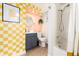 Stylish bathroom with updated fixtures and bright, unique design at 4520 S Delaware St, Englewood, CO 80110