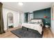 A well-designed bedroom with modern furnishings and updated lighting at 4520 S Delaware St, Englewood, CO 80110