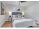 Cozy bedroom featuring a comfortable bed with decorative pillows and side tables with lamps at 4520 S Delaware St, Englewood, CO 80110