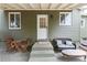Charming front porch with cozy seating, perfect for relaxing at 4520 S Delaware St, Englewood, CO 80110