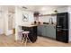 Basement kitchen area with eat in area and updated appliances at 4520 S Delaware St, Englewood, CO 80110