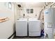 A practical laundry room with modern appliances and efficient layout at 4520 S Delaware St, Englewood, CO 80110