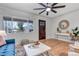 Cozy living room with hardwood floors, stylish furnishings, and ample natural light at 4520 S Delaware St, Englewood, CO 80110