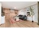 Modern living room featuring a plush grey sofa and stylish decor at 4520 S Delaware St, Englewood, CO 80110