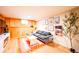 Cozy living room area featuring a comfortable gray couch, stylish coffee table and a decorative orange rug at 4520 S Delaware St, Englewood, CO 80110