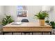 Simple home office desk with light wood top and black metal legs at 501 S Dale Ct, Denver, CO 80219