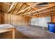 Unfinished garage interior with high ceilings and ample space at 501 S Dale Ct, Denver, CO 80219