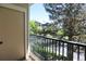 Balcony with black metal railing and tree view at 2162 Concord Ln, Superior, CO 80027