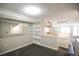 Cozy bedroom features neutral walls, carpeting, large mirror, and open layout at 2162 Concord Ln, Superior, CO 80027