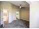 Bedroom with gray carpet features entry to bathroom and closet at 2162 Concord Ln, Superior, CO 80027