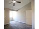 Bedroom with gray carpet features a vaulted ceiling and a window at 2162 Concord Ln, Superior, CO 80027