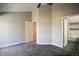 Bedroom with en-suite bathroom with gray carpet at 2162 Concord Ln, Superior, CO 80027