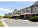 Townhome exteriors feature neutral paint, green roofs, and well-maintained landscaping at 2162 Concord Ln, Superior, CO 80027