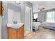 Bright and airy bathroom connected to a bedroom at 14242 E Hawaii Cir # C, Aurora, CO 80012