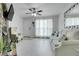 Inviting living room with a cozy armchair, neutral tones, and lots of natural light at 14242 E Hawaii Cir # C, Aurora, CO 80012