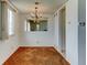 Cozy dining room featuring a vintage chandelier and neutral decor at 6650 E Arizona Ave # 138, Denver, CO 80224