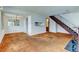 Open living room featuring a staircase, cut out, and a neutral color palette at 6650 E Arizona Ave # 138, Denver, CO 80224